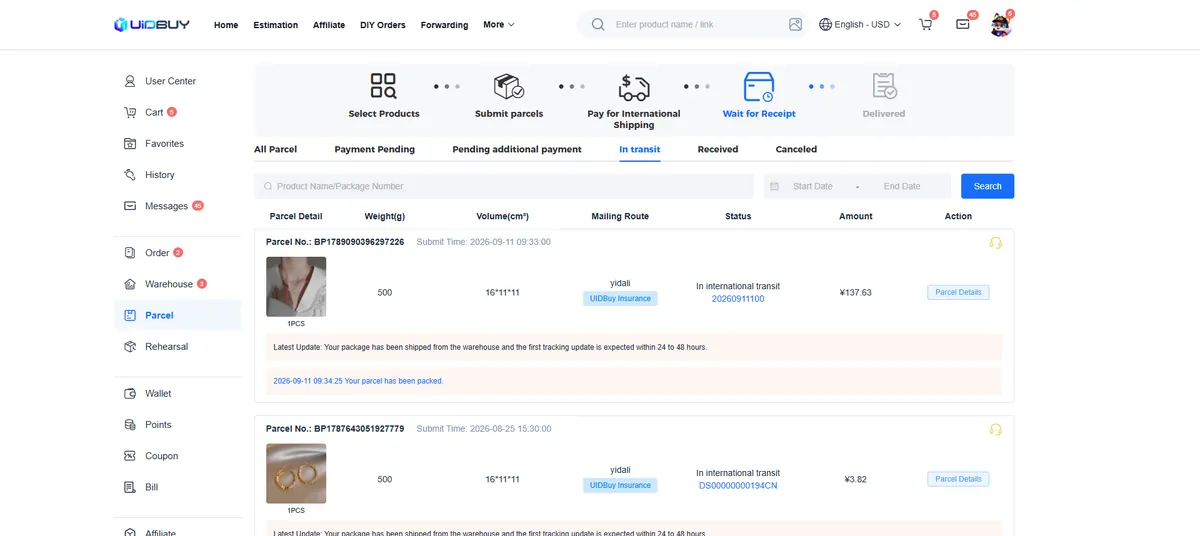 UIDBuy parcel list filtered to In transit, showing two parcels with tracking numbers and a latest update line