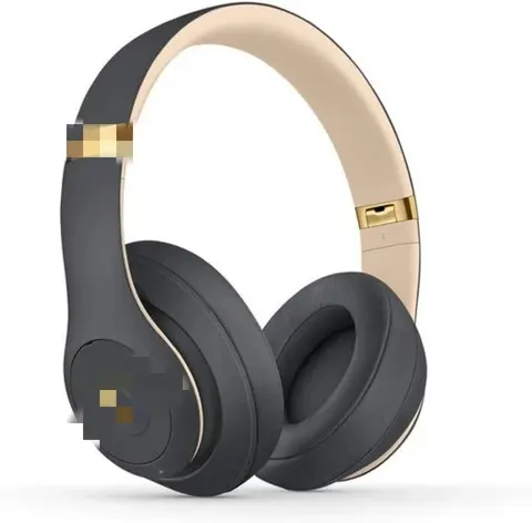 Dark gray over-ear wireless headphones with gold slider accents