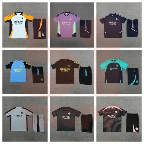 Nine football training sets, each a short-sleeve top with matching shorts